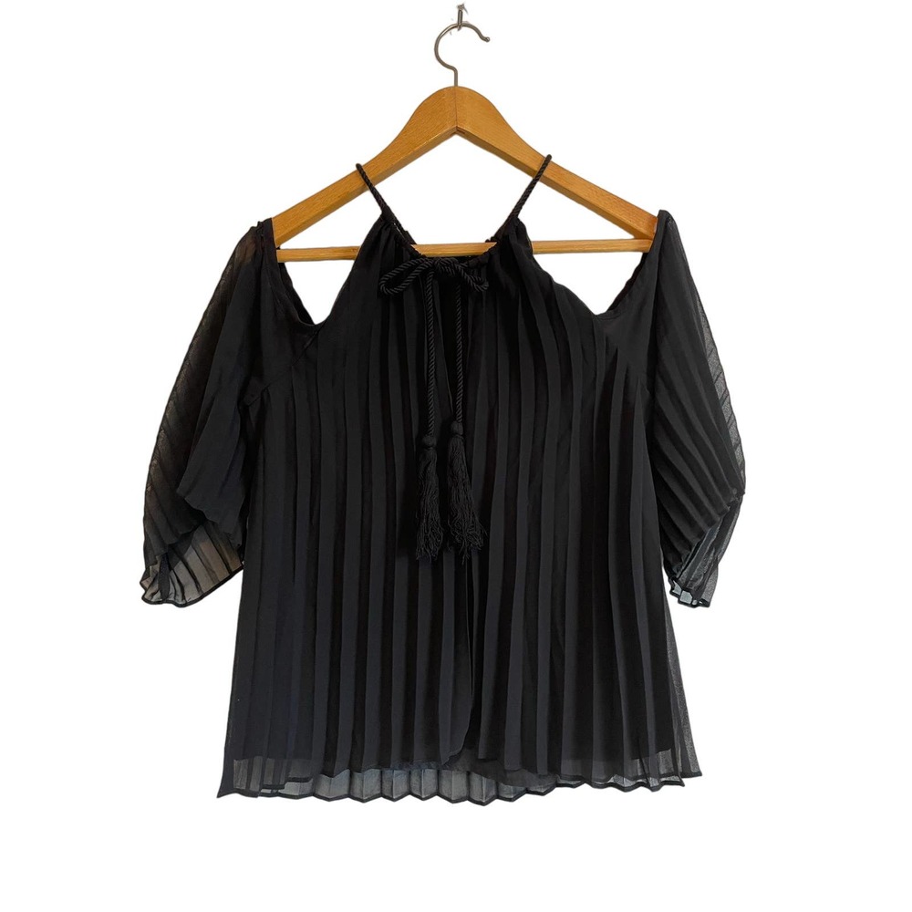 BB Dakota black cold shoulder sheer pleated top halter tasseled. Size Med.
